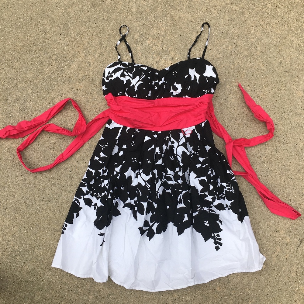 black and white dress with pink belt